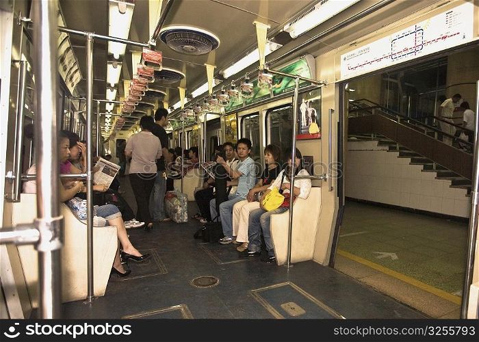 Passengers in a subway train, Beijing, China