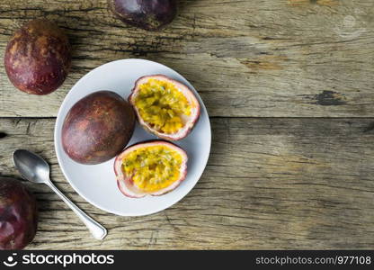 passion fruit on white plate.