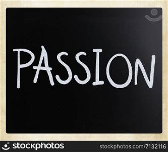 ""Passion" handwritten with white chalk on a blackboard"