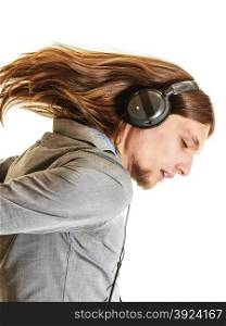 Passionate music lover. Man with headphones.. Passionate music lover with long hair flying. Young man listening through headphones relaxing enjyoing. People relax leisure passion concept. Isolated on white background.