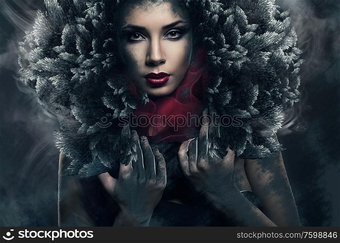 passionate woman in black feather hood
