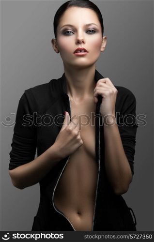 Passionate woman on a gray background