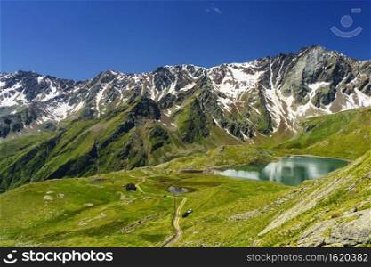 Passo Gavia, Brescia province, Lombardy, Italy  landscape along the mountain pass at summer. Lake