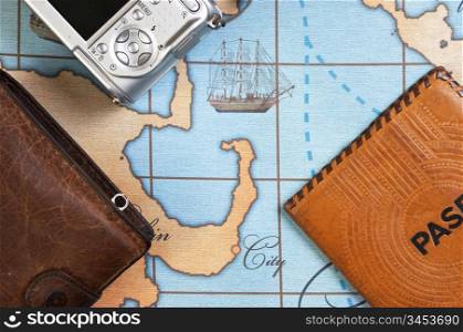 passport and purse on the map