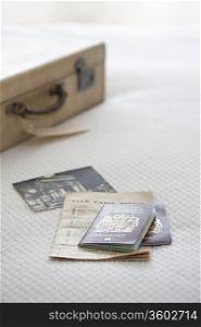 Passport and tickets with suitcase