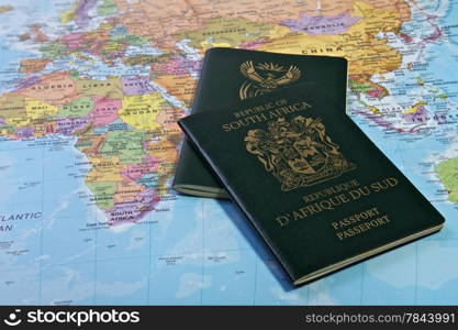 Passport Travel. South African Passport With the World map in the Background