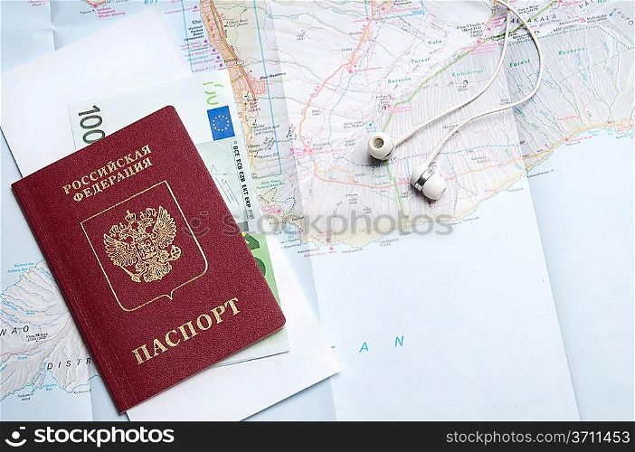 passport with euro and blank paper over map