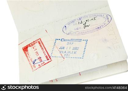Passport with multiple stamps isolated over white