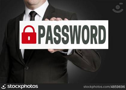 password placard is held by businessman. password placard is held by businessman.