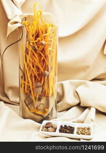 Pasta And Decorated Spices Against Beige Textile Drapery. Pasta And Spices