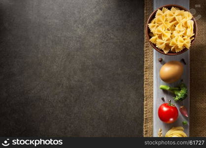 pasta and food ingredient on dark background