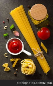 pasta and food ingredient on dark background