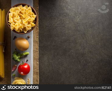 pasta and food ingredient on dark background