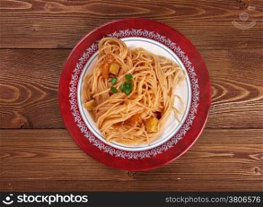 Pasta asciutta - pastasciutta cooked pasta is plated and served with a complementary sauce or condiment