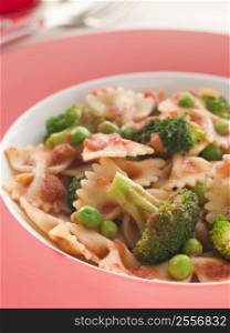 Pasta Bows with Tomato Sauce Broccoli and Peas