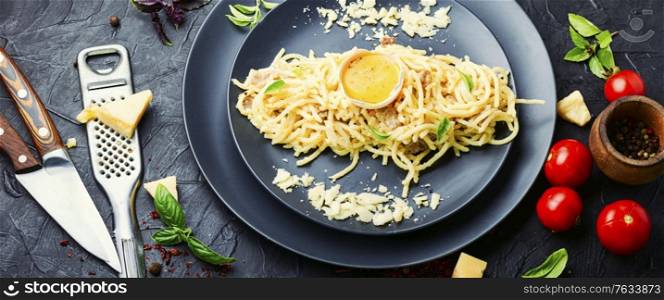 Pasta carbonara or spaghetti with bacon and parmesan cheese.Italian food. Pasta carbonara with bacon