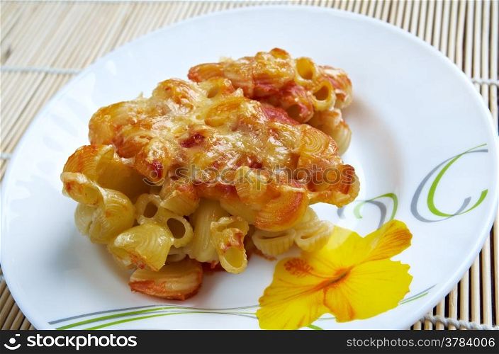 pasta Elbow macaroni bake with pancetta, tomato sauce and mozzarella