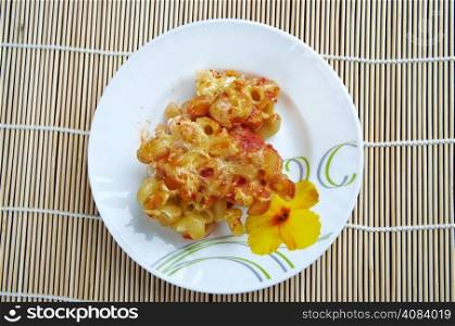 pasta Elbow macaroni bake with pancetta, tomato sauce and mozzarella