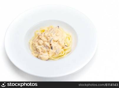 Pasta food with shrimps, herbs and mashrooms isolated on white background in studio