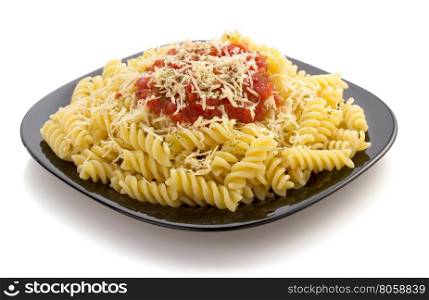 pasta fusilli in plate isolated on white background