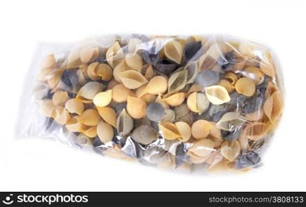 pasta in bag in front of white background