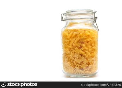 Pasta in glass jar pot isolated on white background