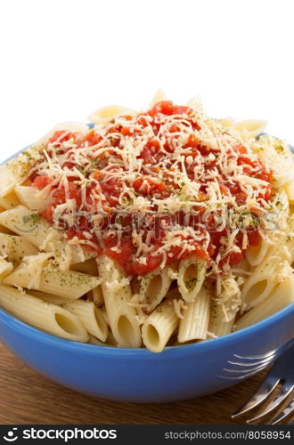 pasta Penne in plate isolated on white background