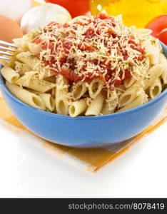 pasta Penne in plate isolated on white background