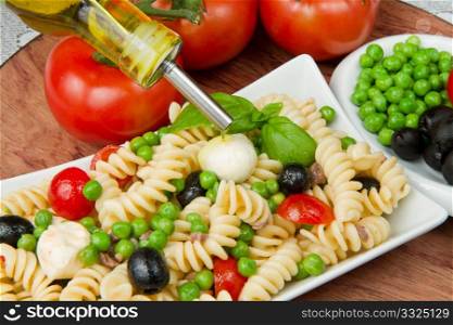 Pasta salad with mozzarella and basil