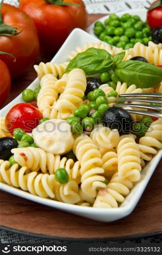 Pasta salad with mozzarella and basil