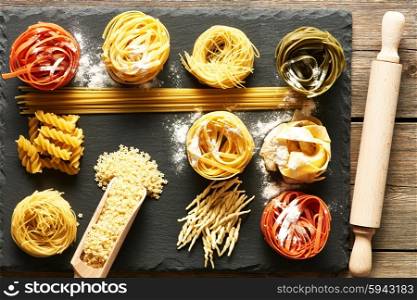 Pasta set over slate background