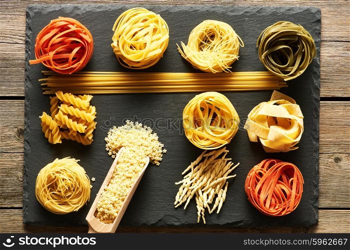 Pasta set over slate background