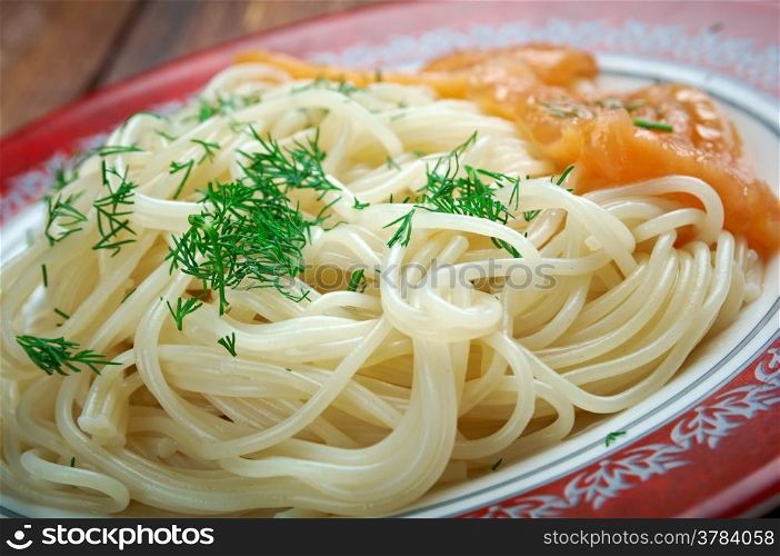 Pasta vermicelli with salmon . closeup