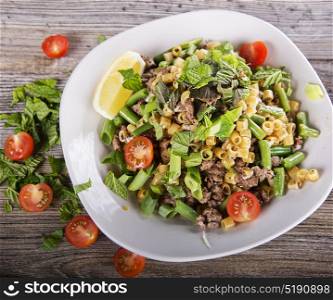 Pasta with ground beef and vegetables. Pasta with ground beef