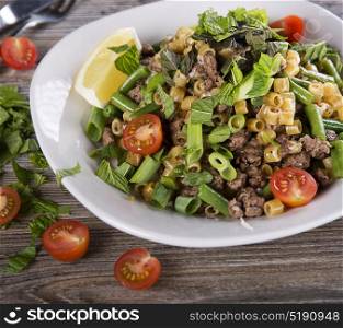 Pasta with ground beef and vegetables. Pasta with ground beef