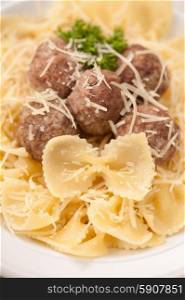 Pasta with meat balls and parmesan. Pasta with meat balls
