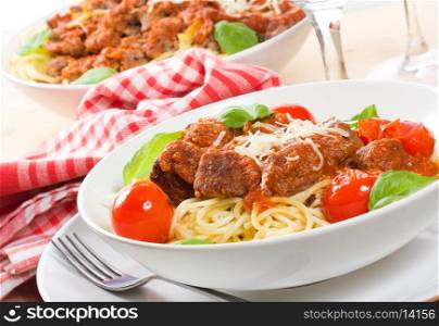 pasta with meatballs and basil with tomato sauce