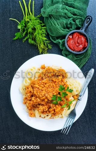 pasta with sauce on the white plate