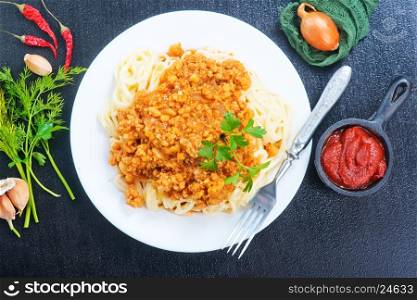 pasta with sauce on the white plate