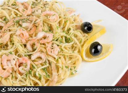 Pasta with shrimps lemon and olive - tasty dish