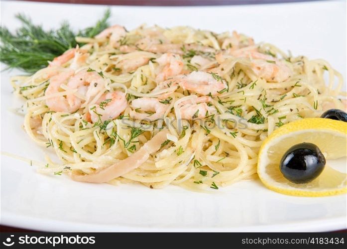 Pasta with shrimps lemon and olive - tasty dish