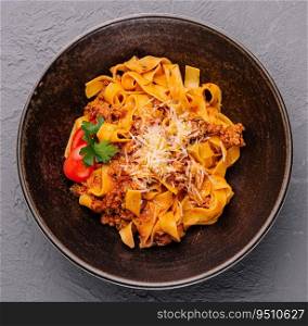 Pasta with tomato sauce and minced meat on plate