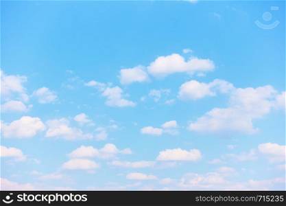 Pastel blue spring sky with light white clouds - Natural background