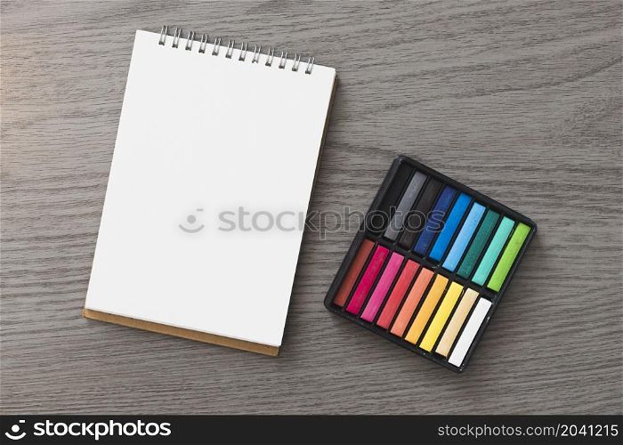 pastel near sketchbook