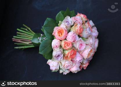 Pastel roses in a bridal bouquet