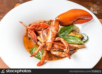 Pastis Grilled Halved Lobster Tails with mussel calamari