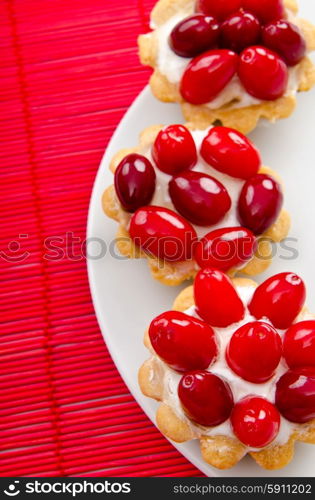 Pastries with berries in the plate