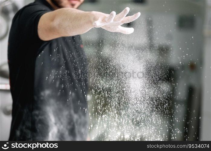 Pastry chef, pouring flour in confectionery kitchen .. Pastry chef, pouring flour in confectionery kitchen.