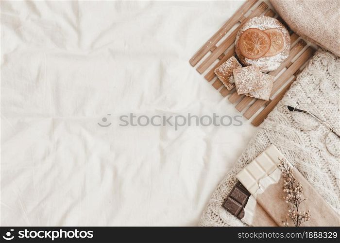 pastry chocolates with herb plaid lying white bedsheet . Resolution and high quality beautiful photo. pastry chocolates with herb plaid lying white bedsheet . High quality and resolution beautiful photo concept