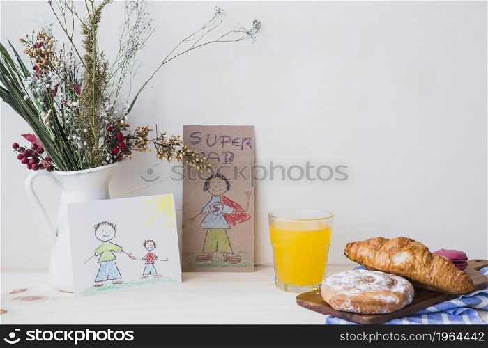 pastry juice near drawings flowers. High resolution photo. pastry juice near drawings flowers. High quality photo